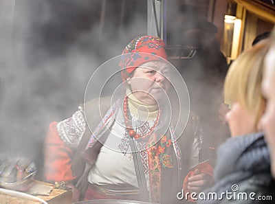 Portrait of a mulled wine vendor. Kyiv, Ukraine Editorial Stock Photo